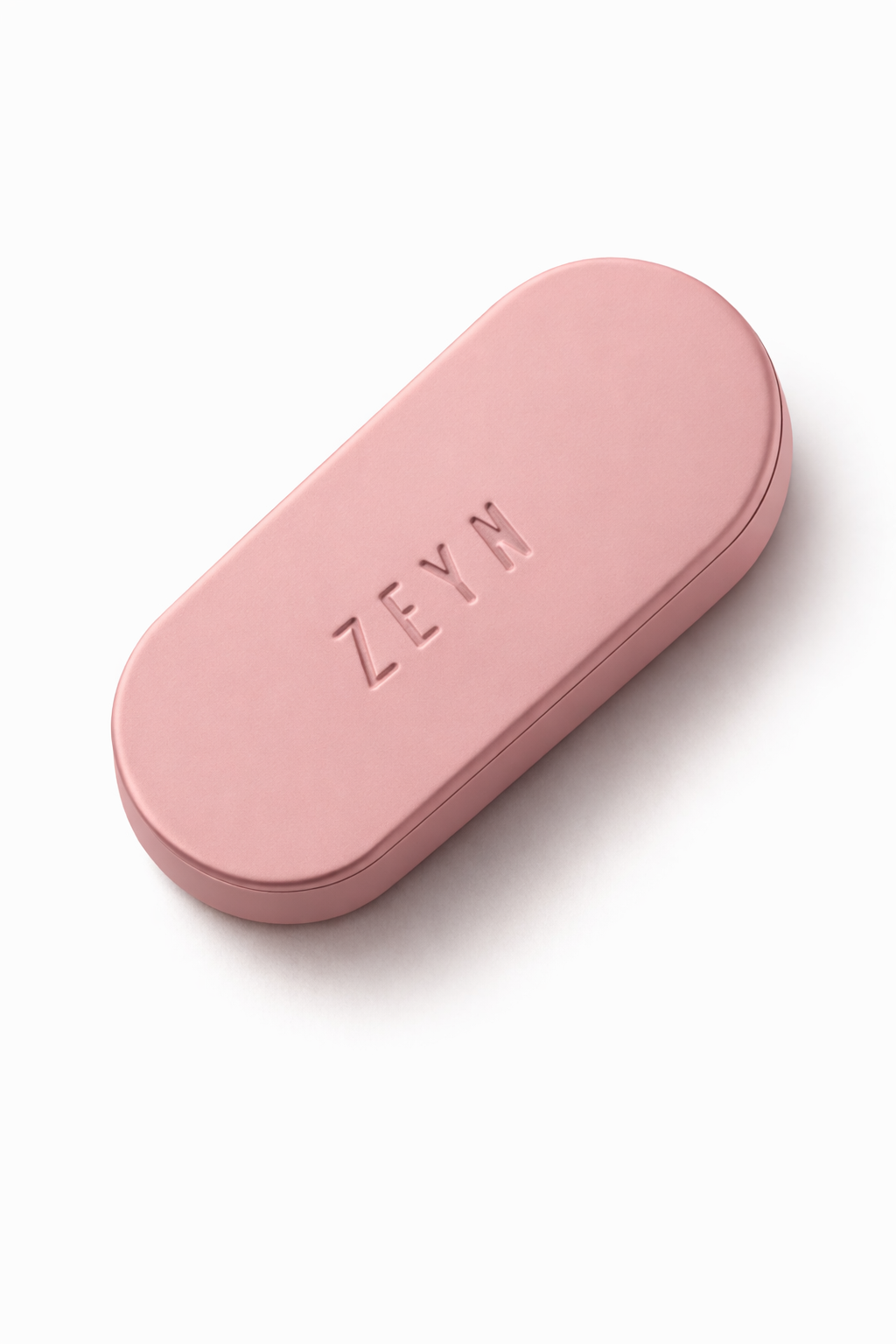 Soft pink ZEYN refillable perfume balm device closed 